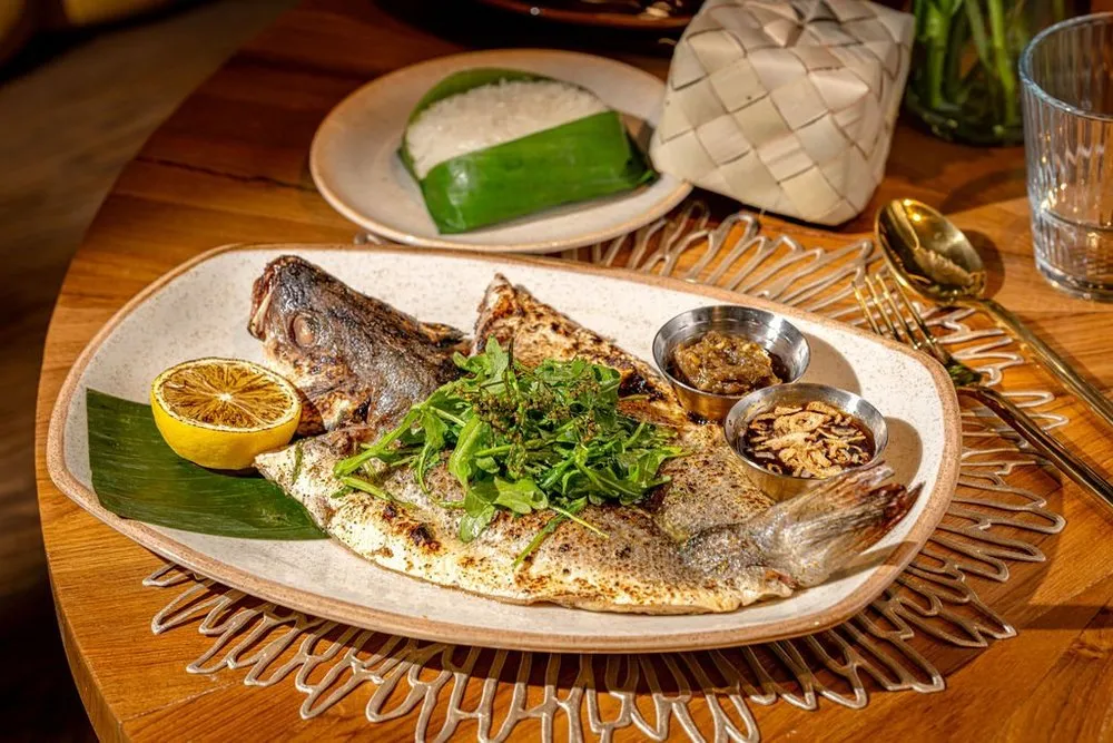 Pla Yang Kluea — grilled branzino with roasted green chili relish